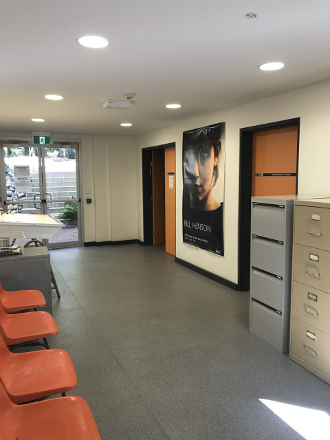 Corridor to the left of the bottom of the stairs