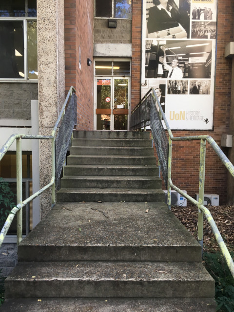 Entrance to the left.