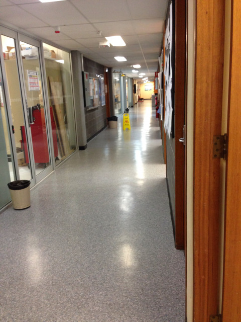 From the entrance go down this corridor