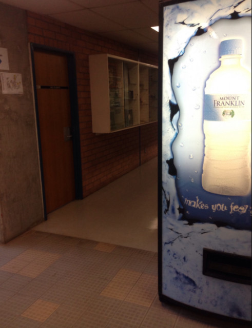 just past the vending machine