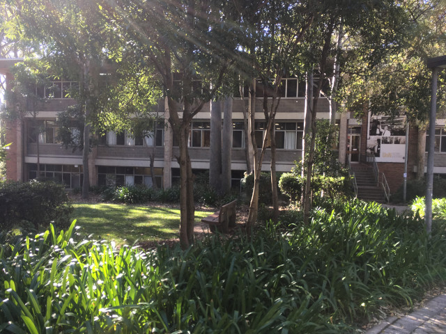 Left side of the building.