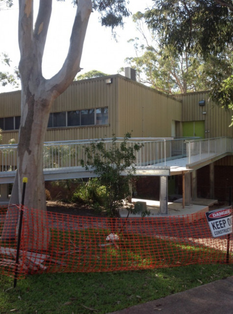 Ramp entryway to Level 1 on the far right of building