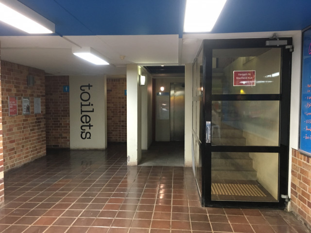 See that big sign that says toilets?