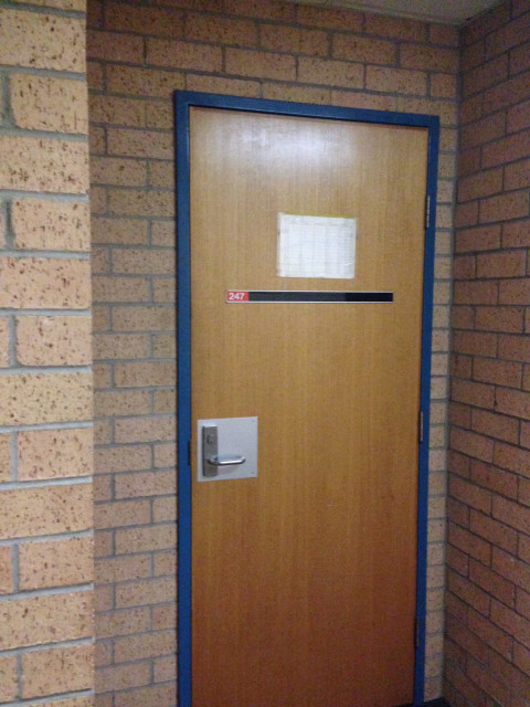 Tucked into the brick wall on your left