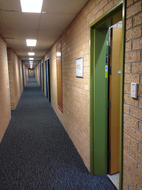 Turn left along and walk along the corridor