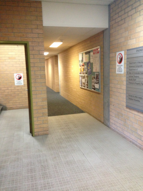 Turn left from main entrance and walk along the corridor