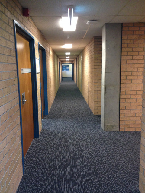 Walk halfway down the corridor